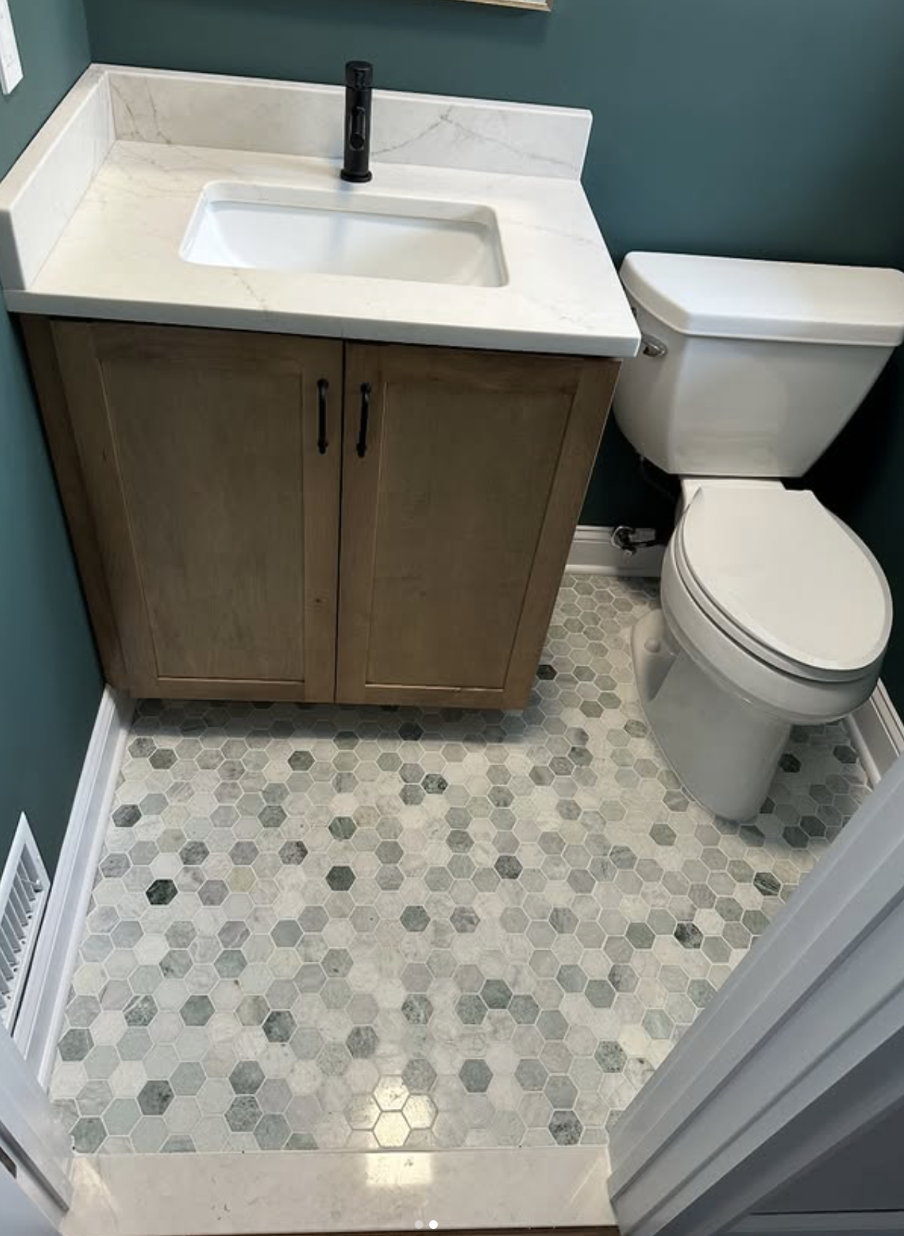 Hex-tile powder room floor by Zollinger Construction in Sayreville, NJ