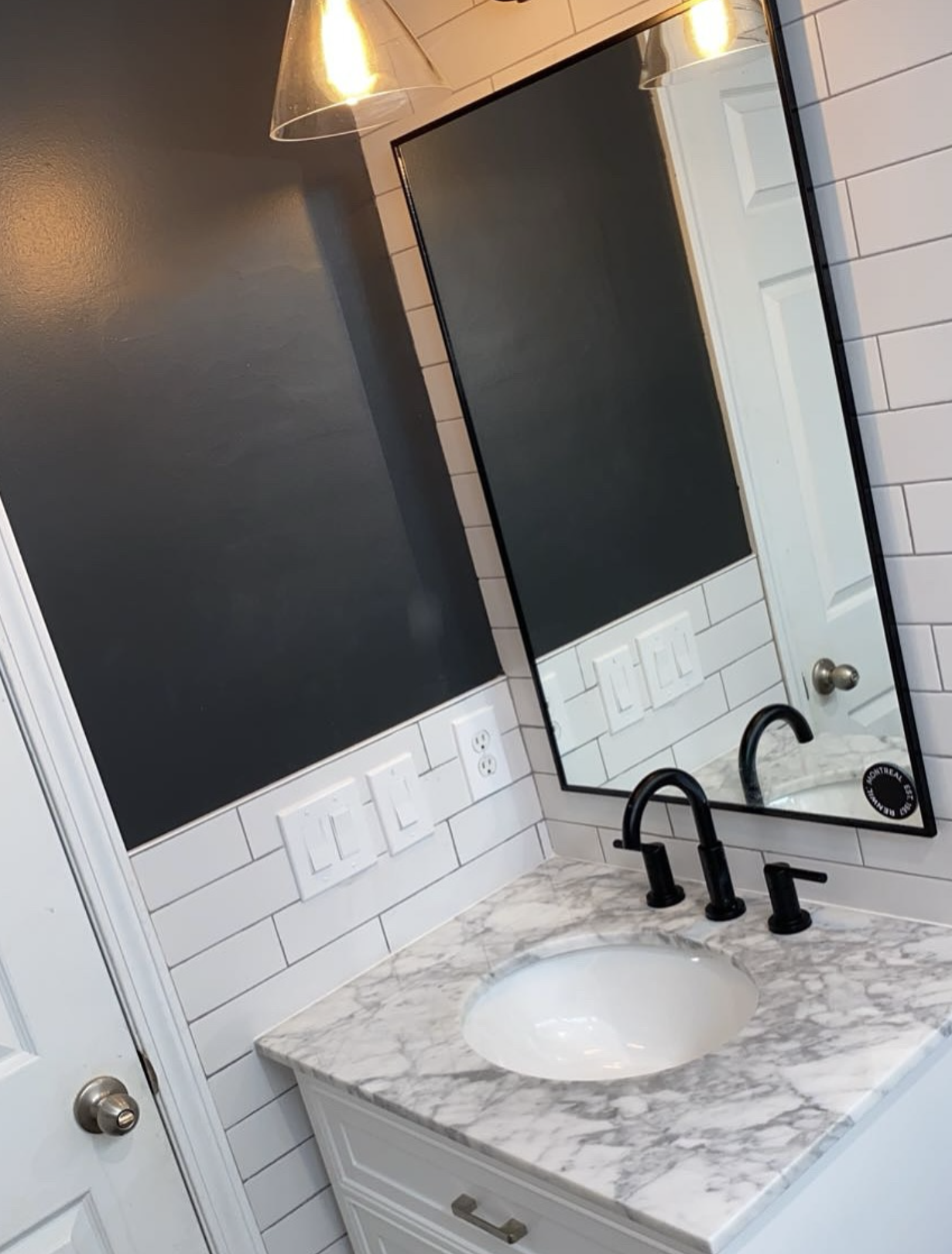 Subway tile vanity with marble top by Zollinger Construction in Matawan, NJ