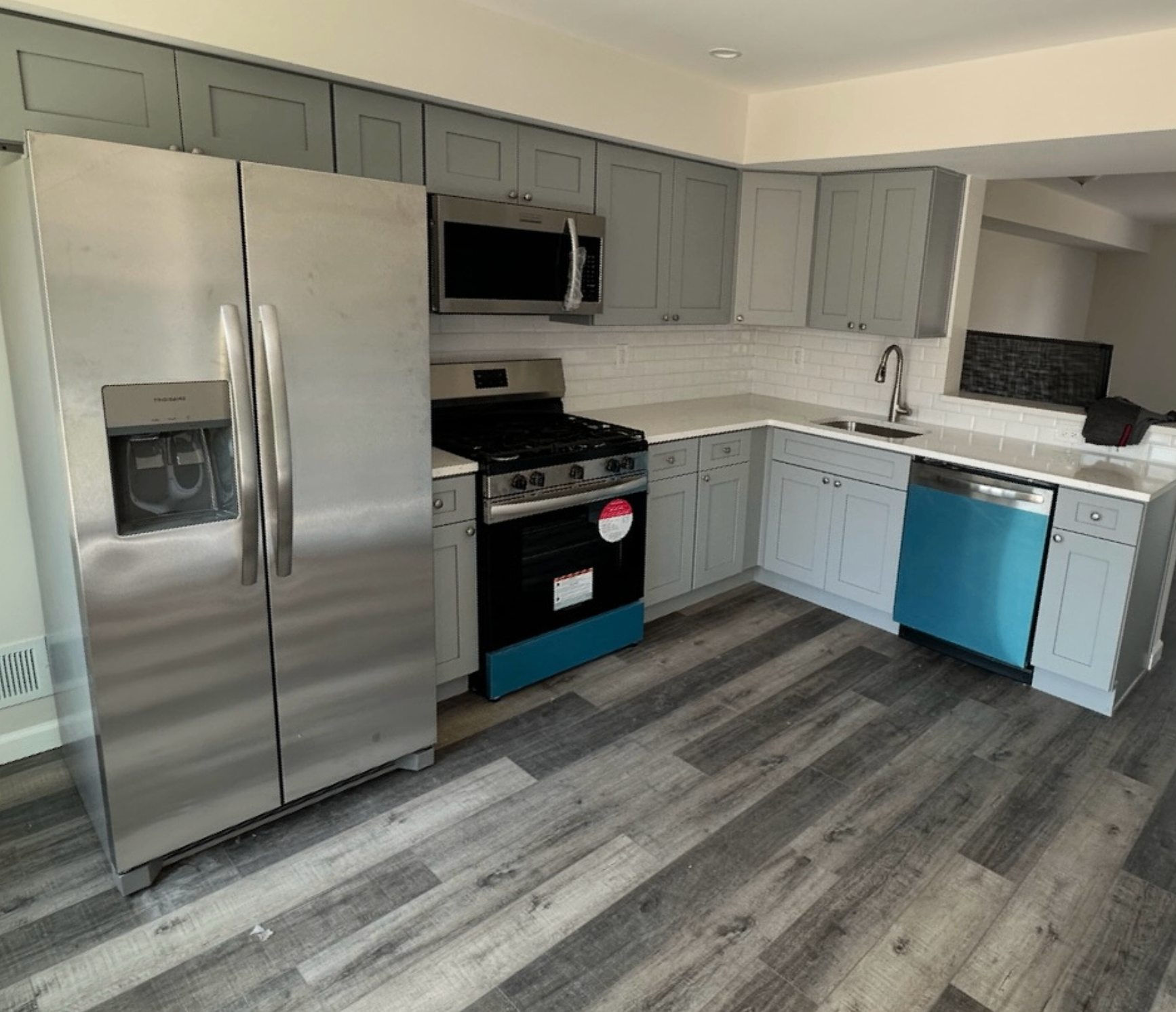 Grey shaker kitchen with stainless appliances in Old Bridge, NJ