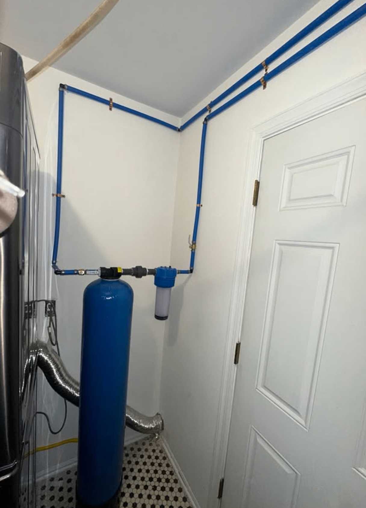 Whole-home water filtration setup by Zollinger Construction in Cheesequake, NJ