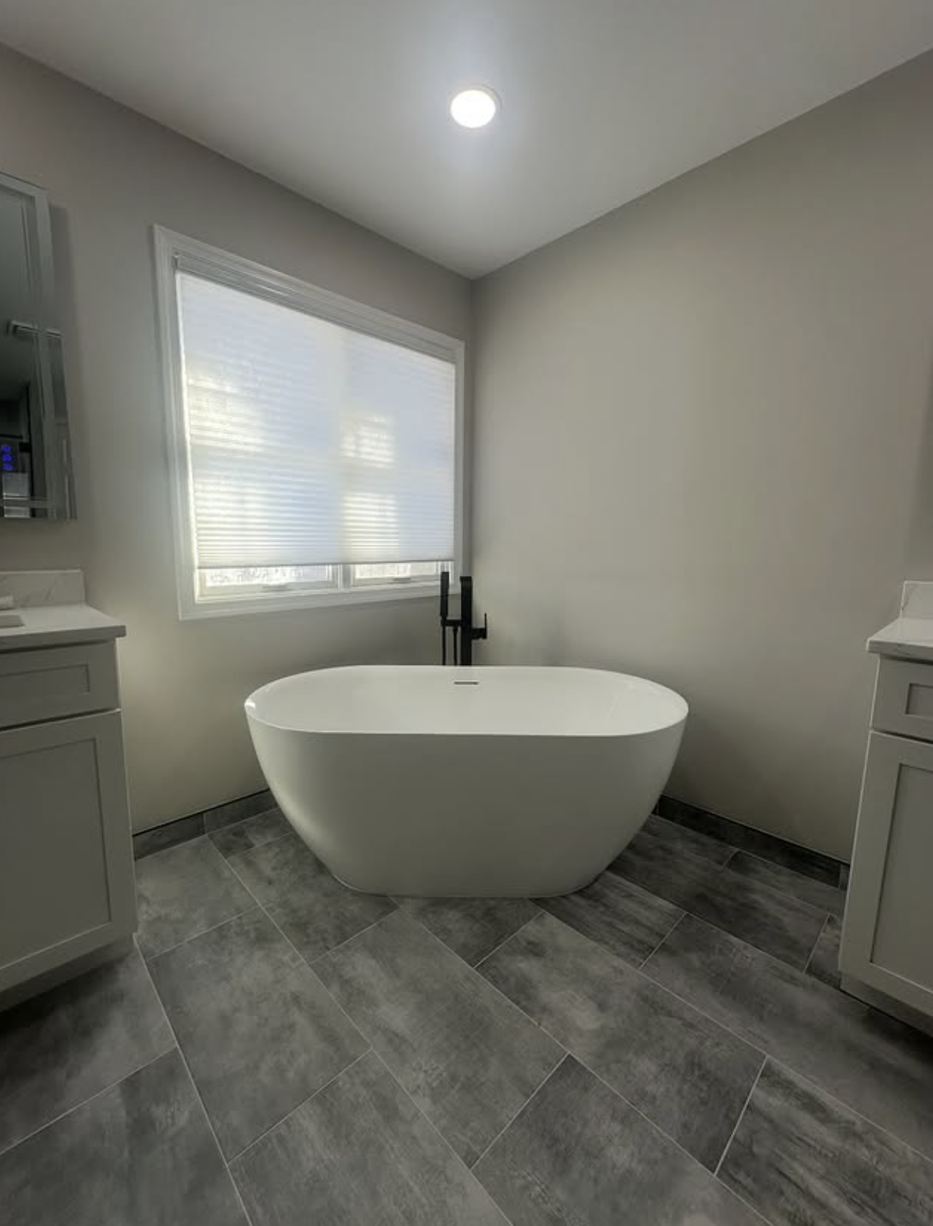 Freestanding soaking tub by Zollinger Construction in South River, NJ
