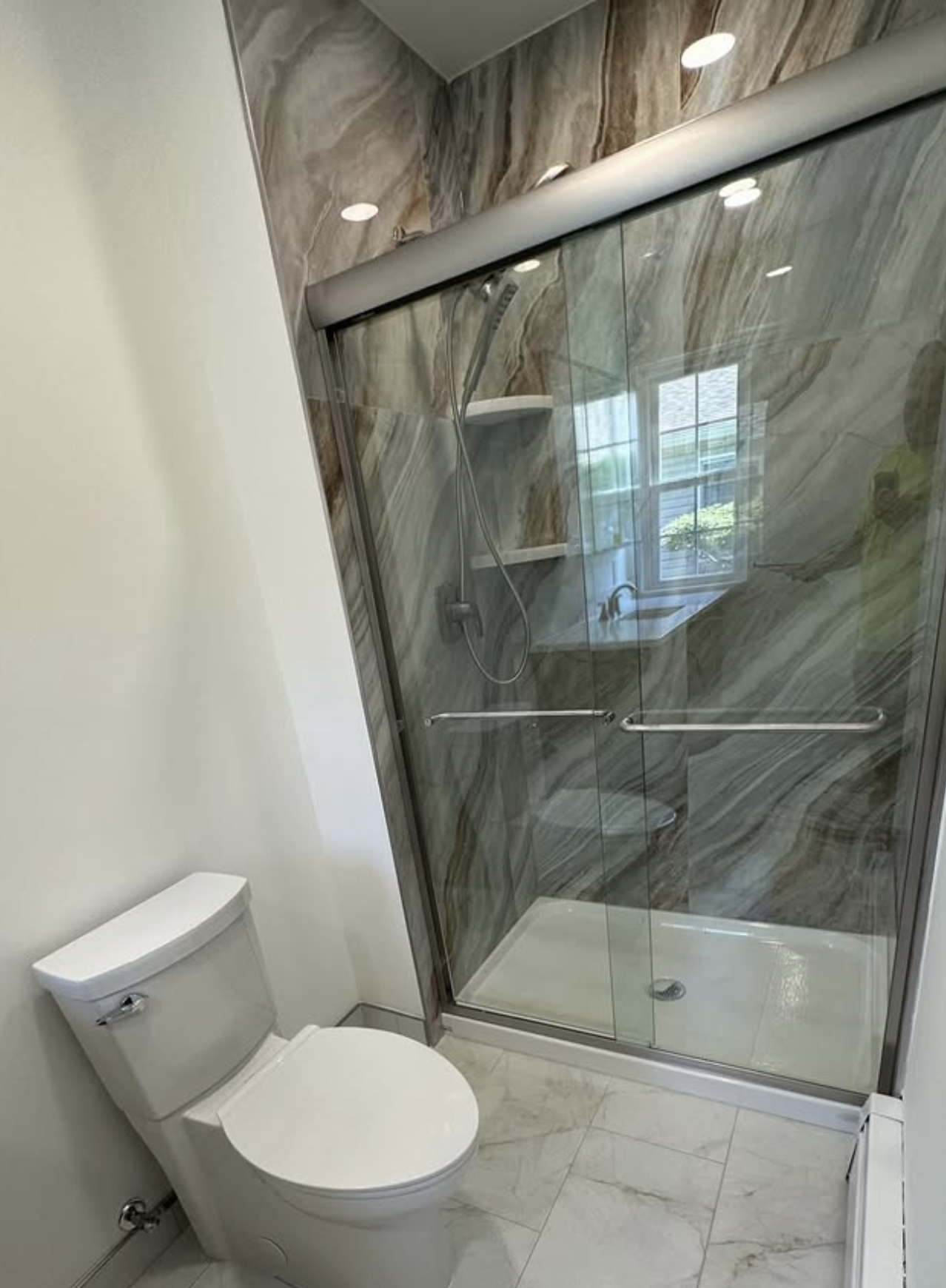 Marble-panel walk-in shower in East Brunswick, NJ